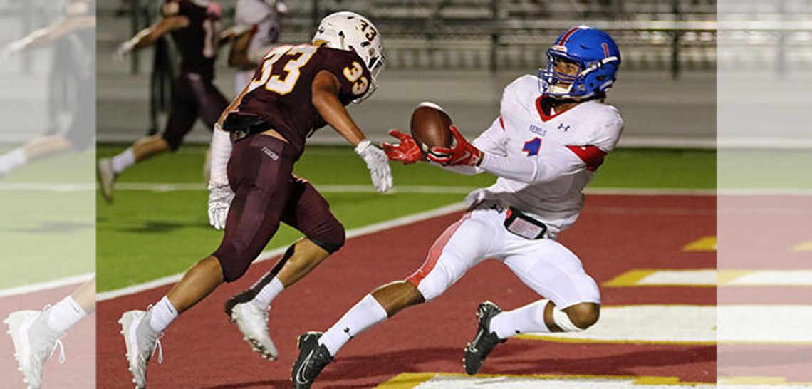 Rebs stun Tigers 22-21