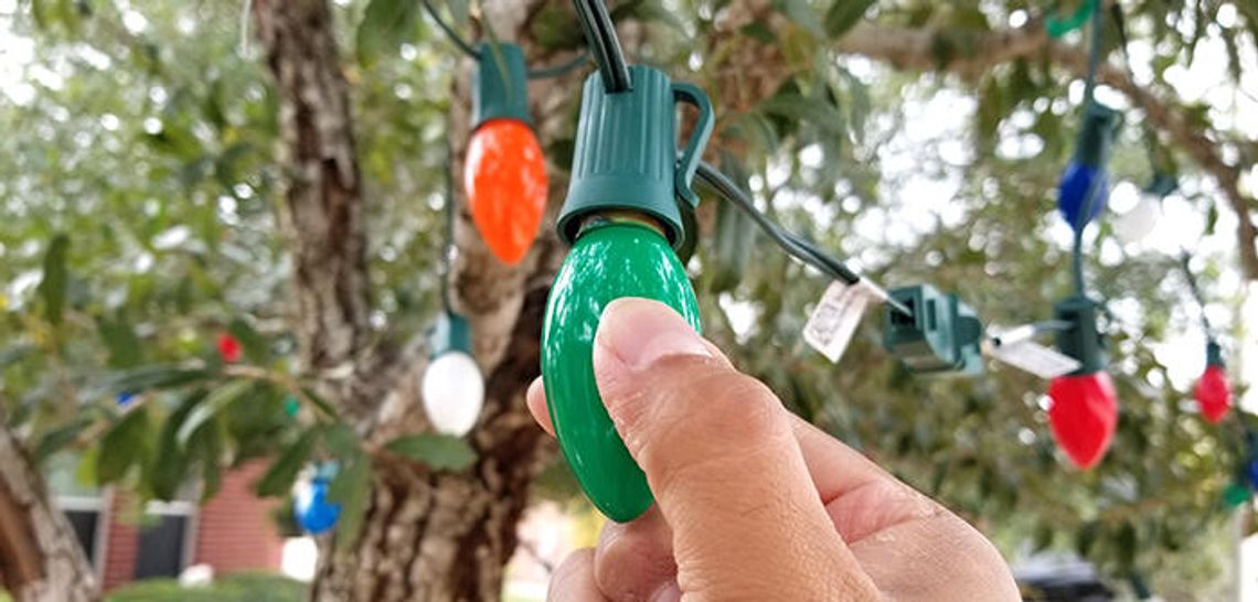 Silver and gold and maybe some green: Businesses cash in on holiday light installation