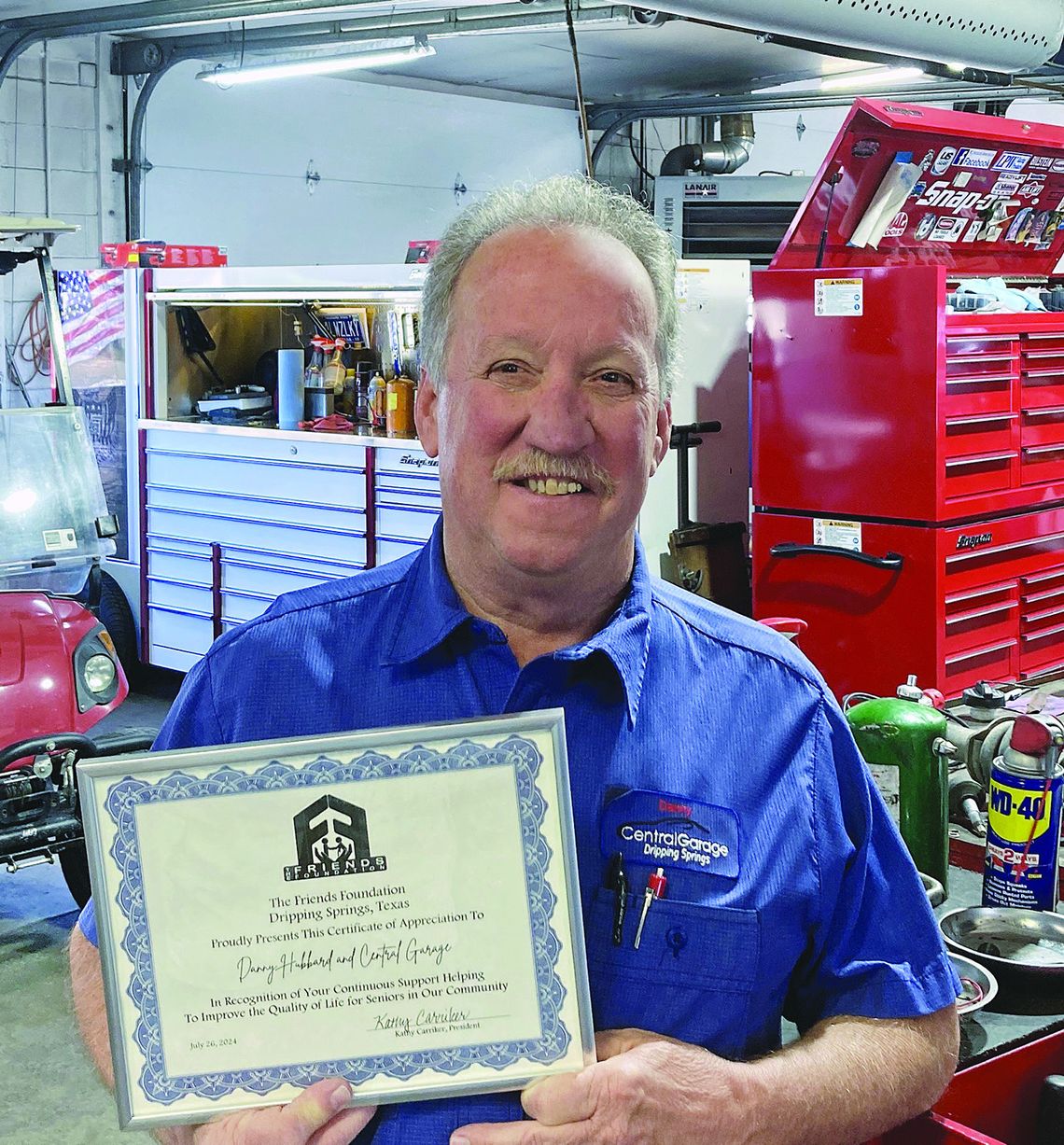 The Friends Foundation presents certificate to Central Garage The Friends Foundation presents certificate to Central Garage