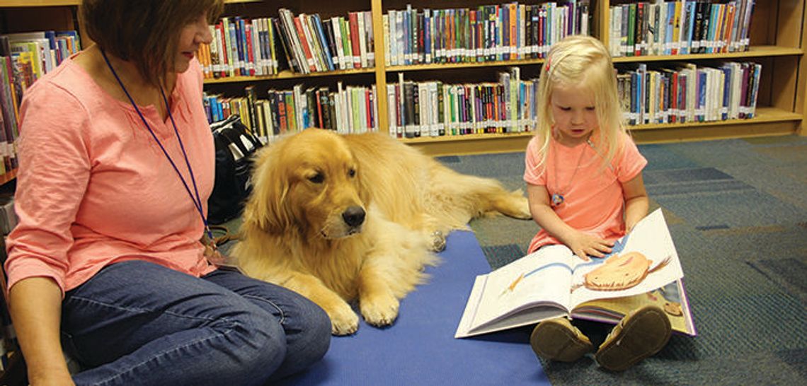Therapy dog program helps Buda kids build confidence in reading