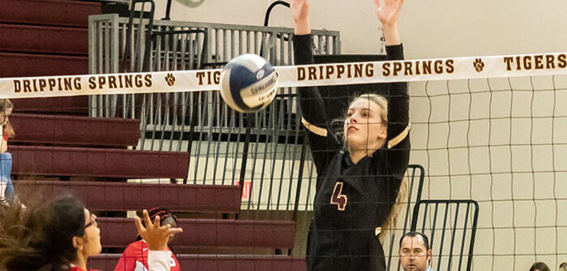Tiger volleyballers crush Travis in three