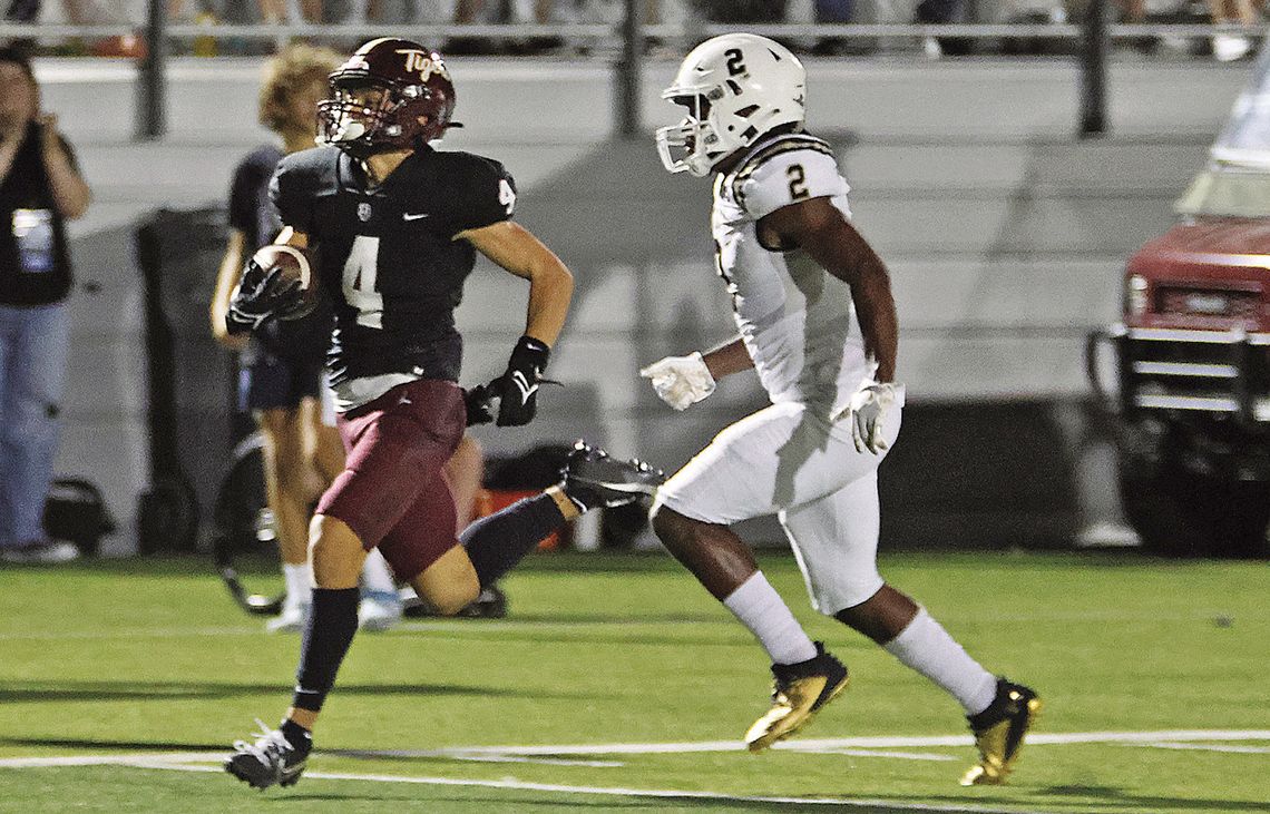 Tigers hold off Jaguars for 49-34 win