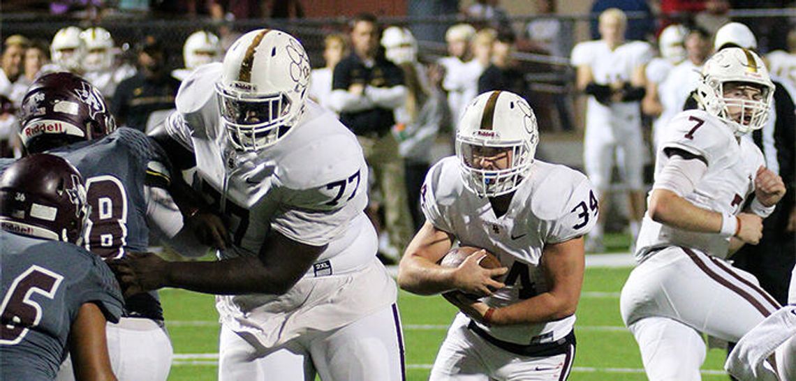Tigers stomp Maroons 63-10 in playoff opener