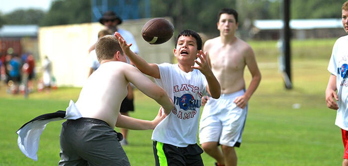 Toughening up at Rebel Football Camp Toughening up at Rebel Football Camp