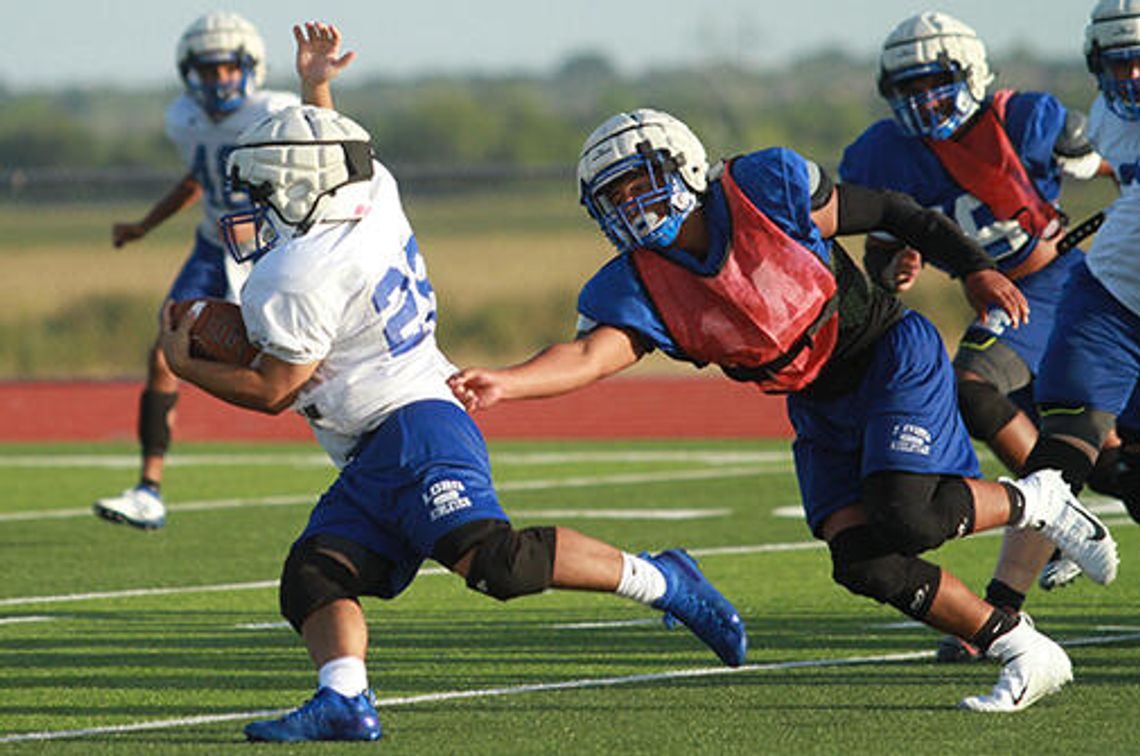 Trojans edge Lobos 34-20