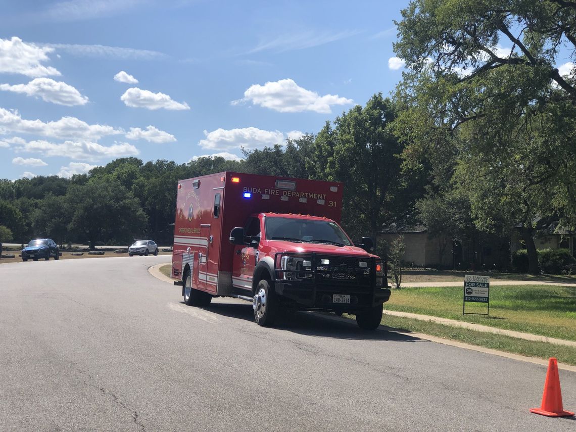 UPDATED: Crews fight grass fire near Buda neighborhood