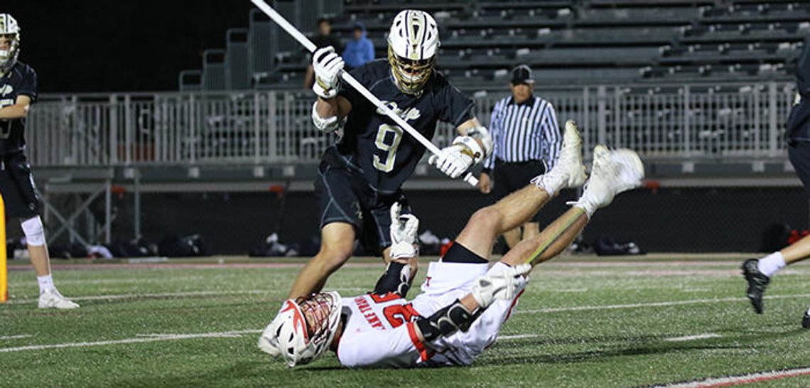 Varsity Tigers lacrosse suffers tough loss against Cavaliers