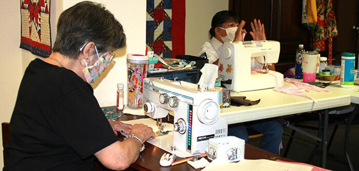 VSO volunteers turning out face masks