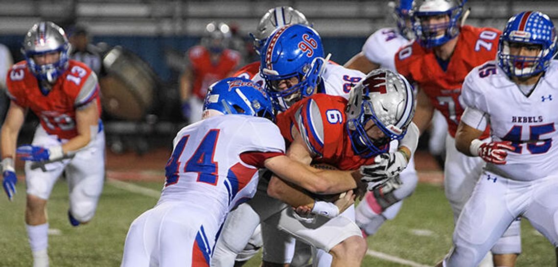 Westlake football pummels Rebels 70-14