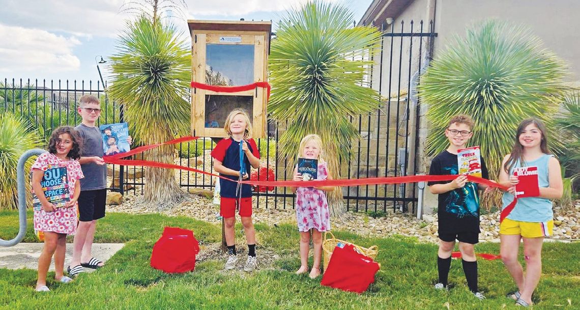 Young Cub Scout builds Little Free Library for Kyle community